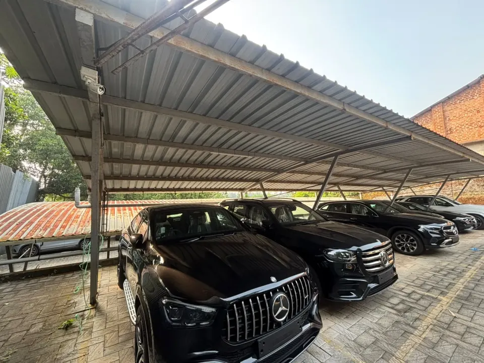 Matrix CCTV camera mounted on the covered parking shed at Bridgeway Motors, Calicut